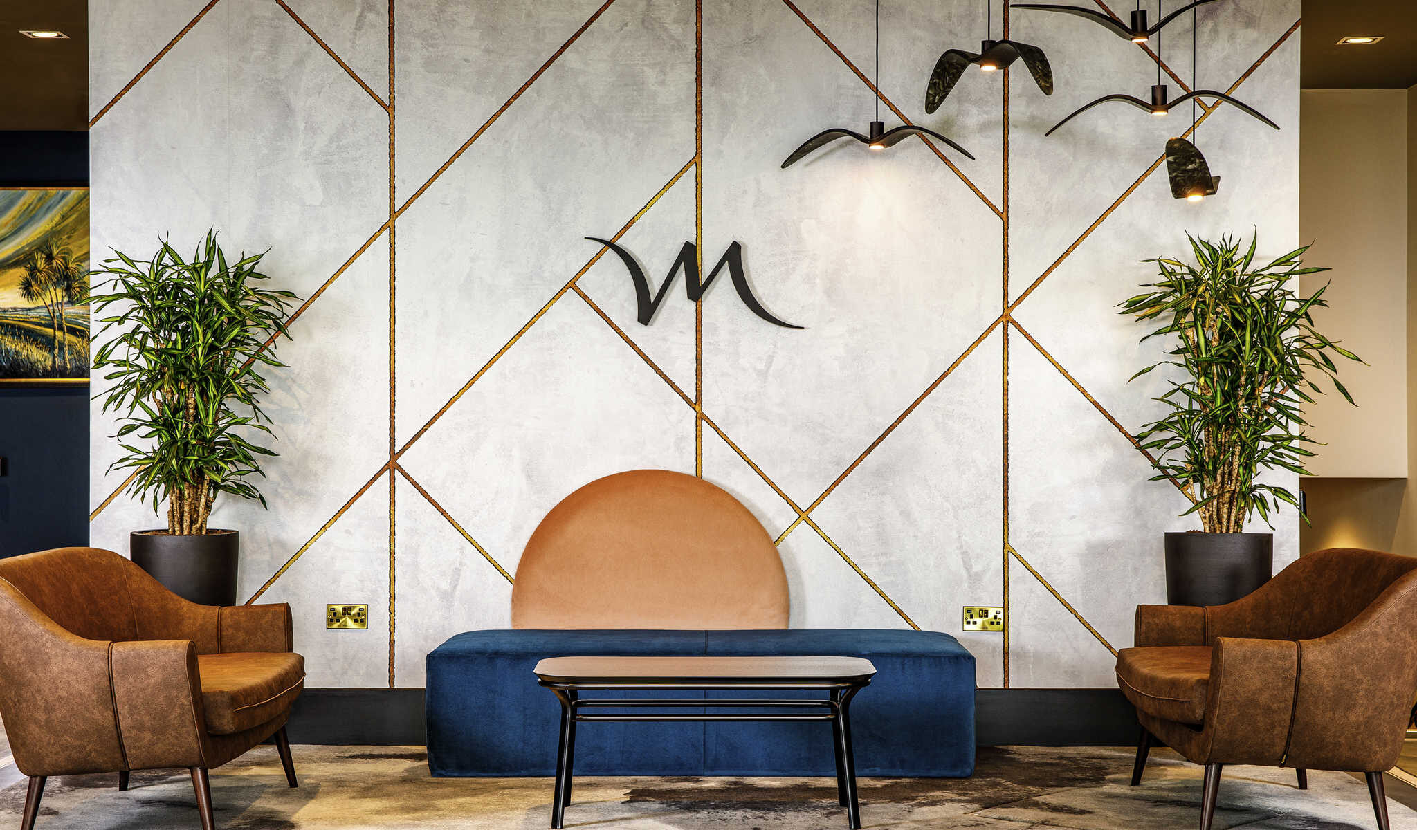 reception area with sofa and armchairs